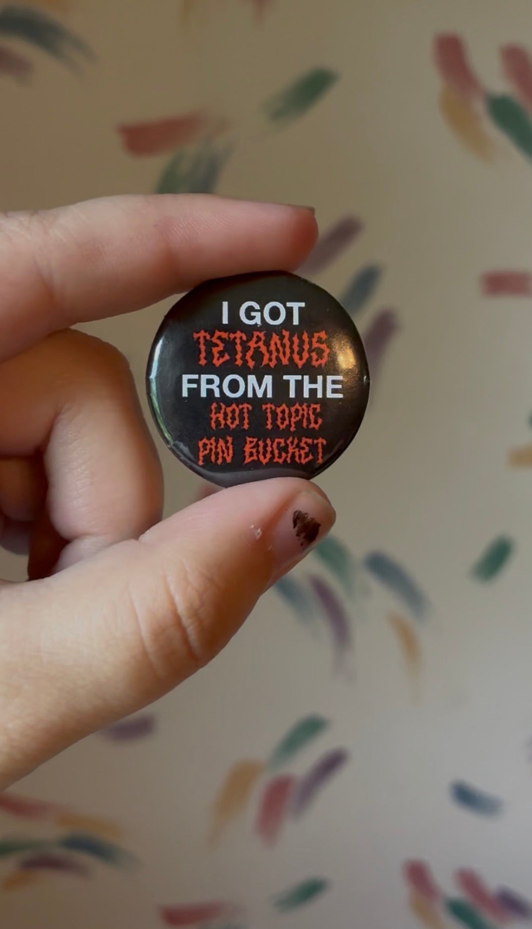 Tetanus Pin Bucket Button